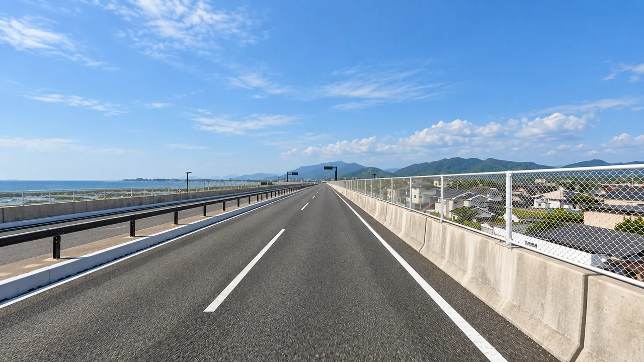 折り返しても、上りは終わらない・折り返し付近の下関北バイパス(AI生成の参考イメージ)